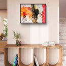 Obra colgada en sala de estar con mueble decorativo debajo.